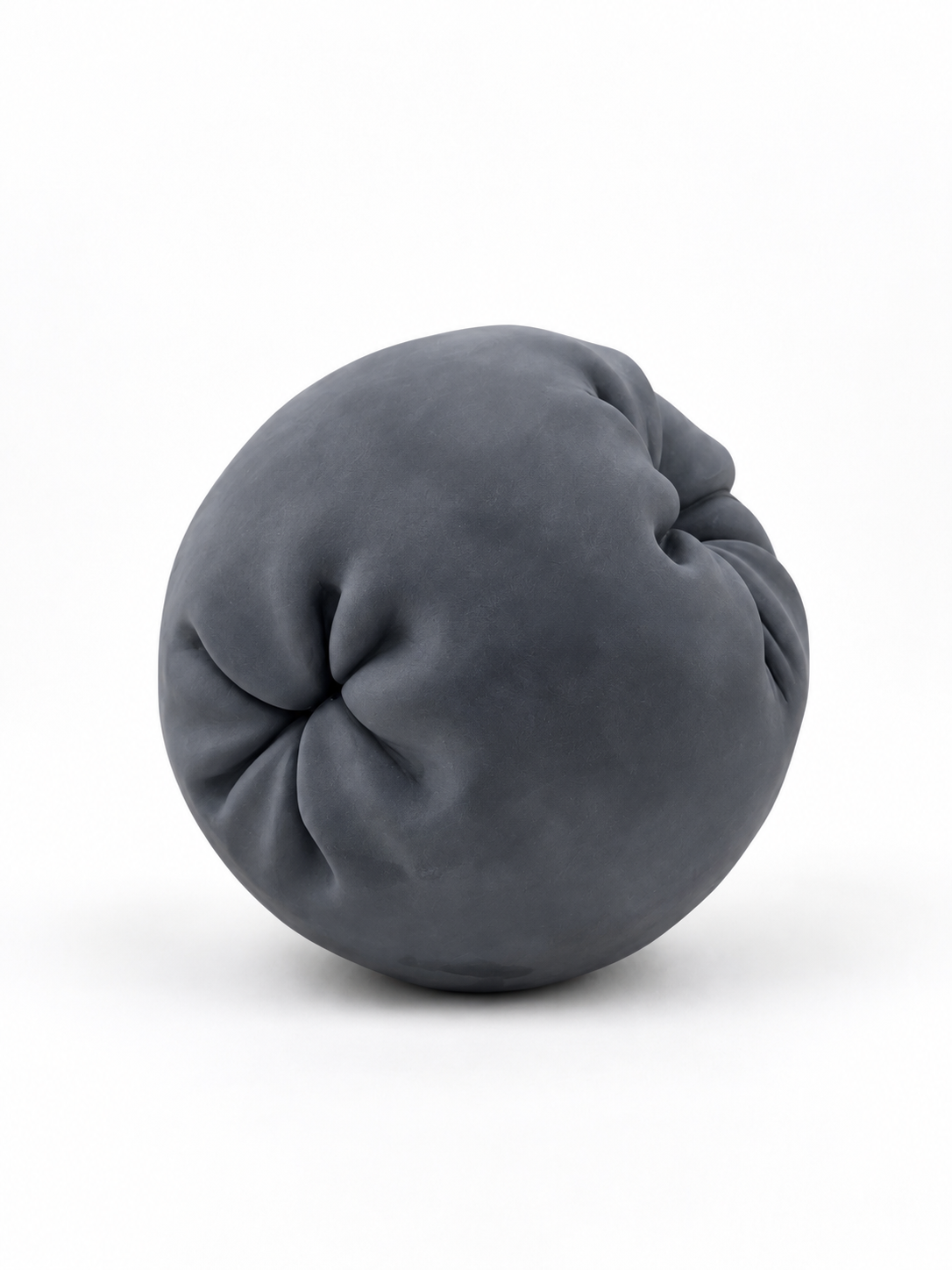 Belgian black marble sculpture by Miriam Gallardo, contemporary spherical organic form with folded texture, side view